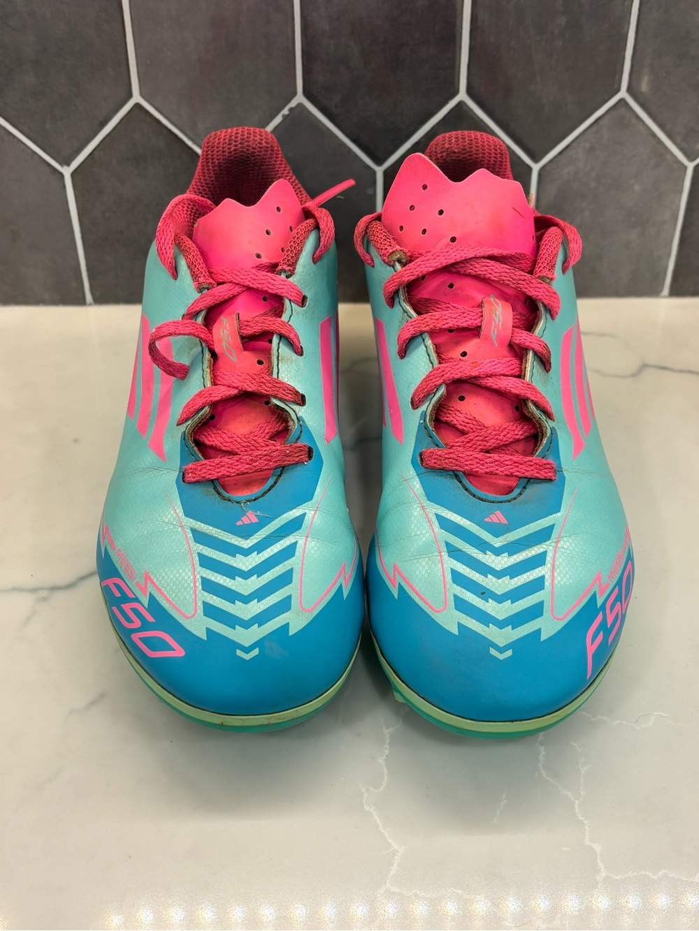 Kids Adidas Cleats in Teal and Pink